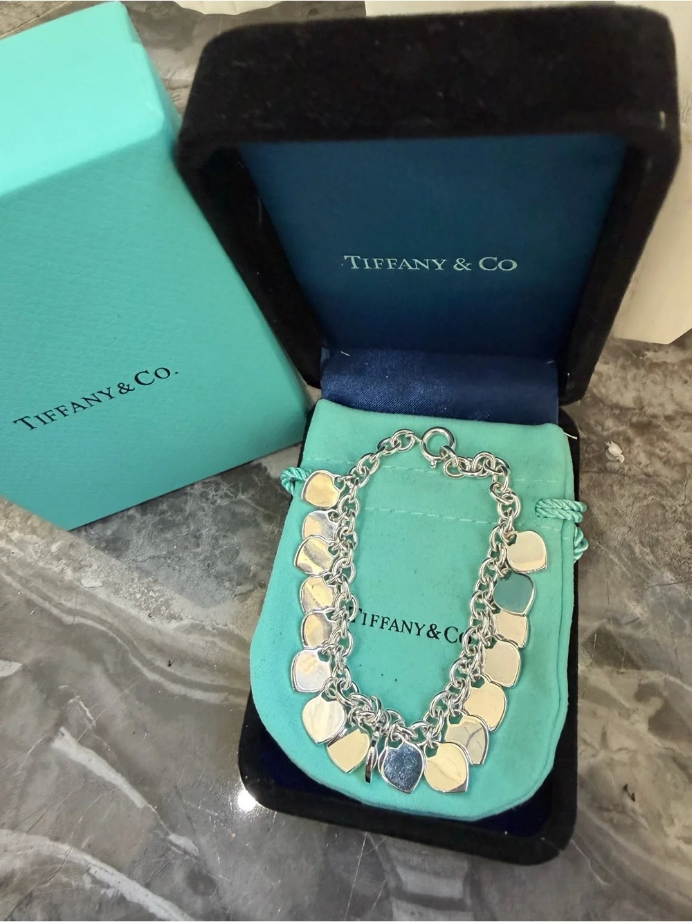 Tiffany & Co. Sterling Silver Multi-Heart Charm Bracelet with Signature Blue
